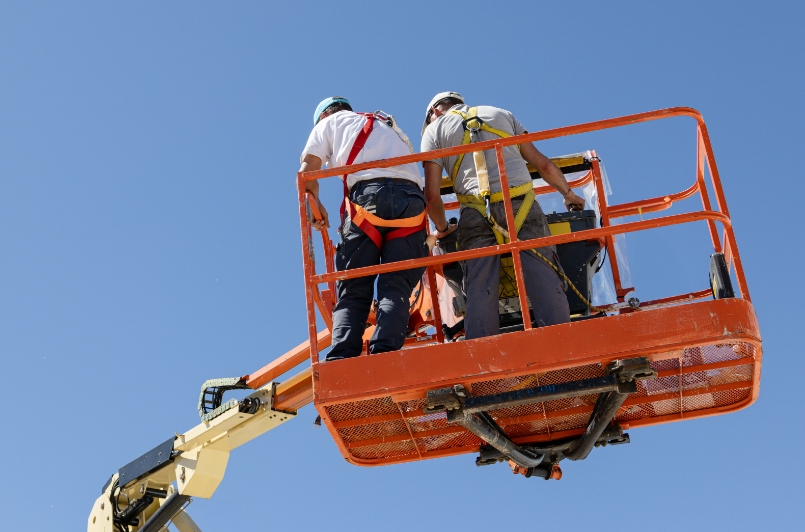 Two men on a work lift