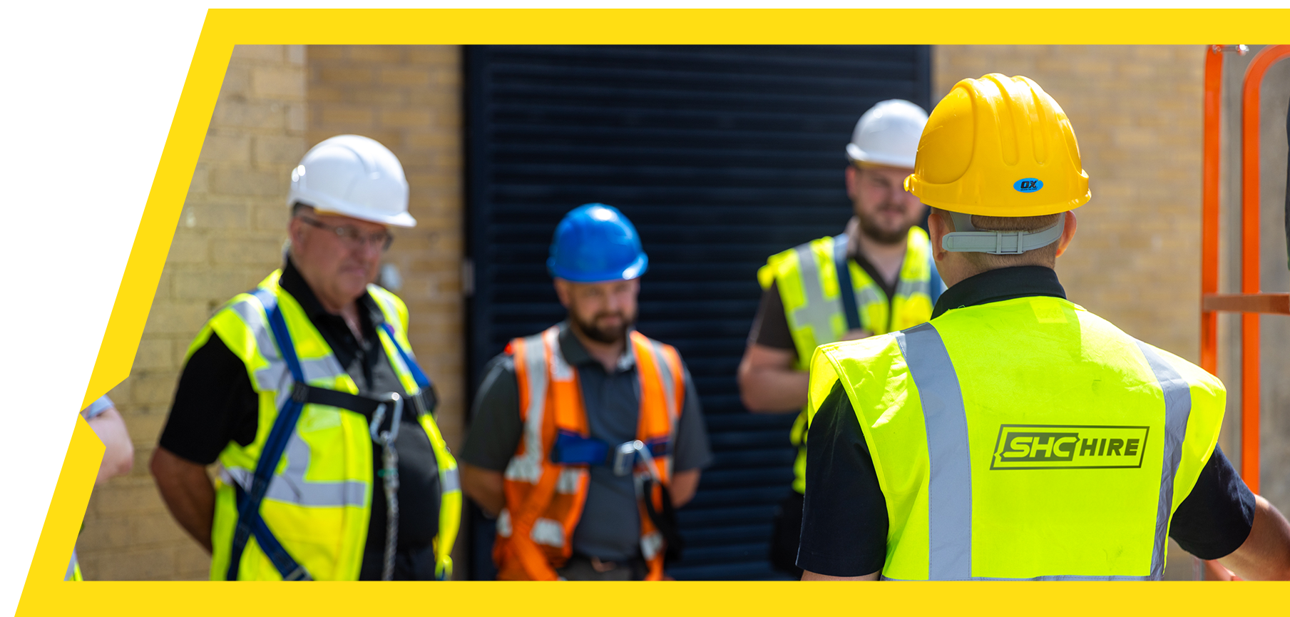 Man wearing a high-viz jacket and hard hat